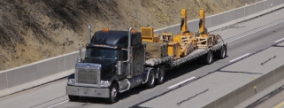 Heavy haul trucking company all U.S. heavy equipment machinery movers.